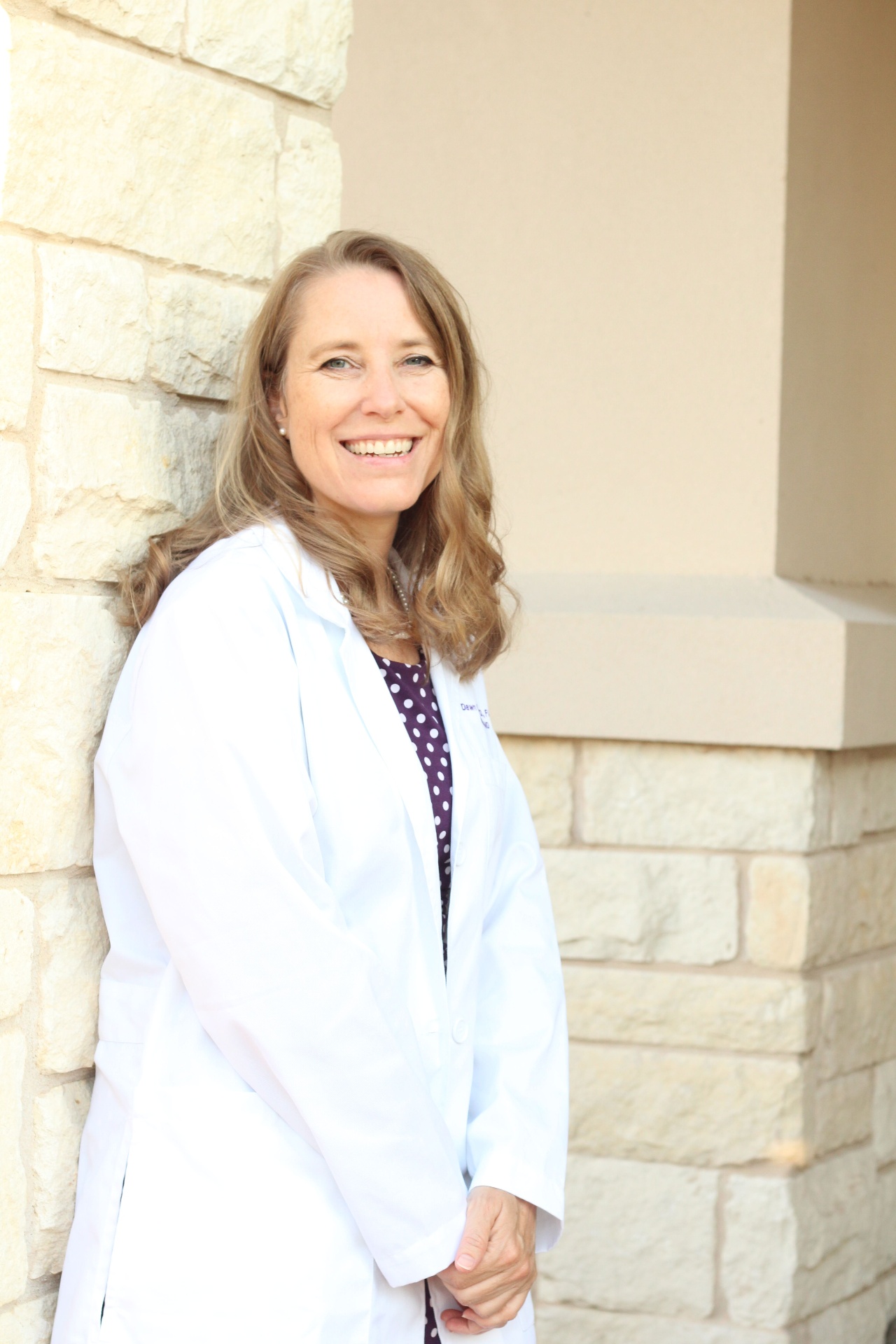 Dr. Sears in white coat